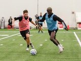 Kelyn Rowe (11), Wilfried Zahibo (23) during New England Revolution first 2020 Training Session at the Field House Gillette Stadium in Foxboro, MA on Monday, January 20, 2020. CREDIT/ CHRIS ADUAMA.