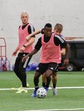 Antonio Delamea, Justin Rennicks (12), Luis Caicedo (27) during New England Revolution first 2020 Training Session at the Field House Gillette Stadium in Foxboro, MA on Monday, January 20, 2020. CREDIT/ CHRIS ADUAMA.