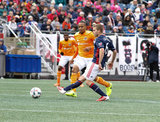 Ricardo Clark (13) and Scott Caldwell (6) during New England Revolution and Houston Dynamo MLS match at Gillette Stadium in Foxboro, MA on Saturday, April 8, 2017.  Revs won 2-0 CREDIT/ CHRIS ADUAMA