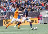 Josh Smith (27) and Erick Torres (9) during New England Revolution and Houston Dynamo MLS match at Gillette Stadium in Foxboro, MA on Saturday, April 8, 2017.  Revs won 2-0 CREDIT/ CHRIS ADUAMA