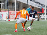 Andrew Farrell (2) and Mauro Manotas (19) during New England Revolution and Houston Dynamo MLS match at Gillette Stadium in Foxboro, MA on Saturday, April 8, 2017.  Revs won 2-0 CREDIT/ CHRIS ADUAMA