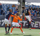 Josh Smith (27) and Jalil Anibaba (2) during New England Revolution and Houston Dynamo MLS match at Gillette Stadium in Foxboro, MA on Saturday, April 8, 2017.  Revs won 2-0 CREDIT/ CHRIS ADUAMA