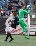 Juan Agudelo (17) and Tyler Deric (1) during New England Revolution and Houston Dynamo MLS match at Gillette Stadium in Foxboro, MA on Saturday, April 8, 2017.  Revs won 2-0 CREDIT/ CHRIS ADUAMA