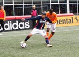 Lee Nguyen (24) and Boniek Garcia (27) during New England Revolution and Houston Dynamo MLS match at Gillette Stadium in Foxboro, MA on Saturday, April 8, 2017.  Revs won 2-0 CREDIT/ CHRIS ADUAMA