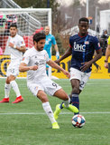 Kenny Saief (93), Wilfried Zahibo (23) during New England Revolution and FC Cincinnati MLS match at Gillette Stadium in Foxboro, MA on Sunday, March 24, 2019. The match ended in 2-0 win for FC Cincinnati. CREDIT/ CHRIS ADUAMA