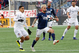 Diego Fagundez (14), Victor Ulloa (8) during New England Revolution and FC Cincinnati MLS match at Gillette Stadium in Foxboro, MA on Sunday, March 24, 2019. The match ended in 2-0 win for FC Cincinnati. CREDIT/ CHRIS ADUAMA