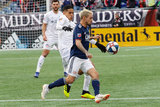 Diego Fagundez (14), Victor Ulloa (8) during New England Revolution and FC Cincinnati MLS match at Gillette Stadium in Foxboro, MA on Sunday, March 24, 2019. The match ended in 2-0 win for FC Cincinnati. CREDIT/ CHRIS ADUAMA