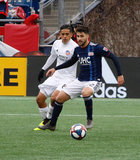 Carles Gil (22), Victor Ulloa (8) during New England Revolution and FC Cincinnati MLS match at Gillette Stadium in Foxboro, MA on Sunday, March 24, 2019. The match ended in 2-0 win for FC Cincinnati. CREDIT/ CHRIS ADUAMA