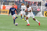 Carles Gil (22), Roland Lamah (7) during New England Revolution and FC Cincinnati MLS match at Gillette Stadium in Foxboro, MA on Sunday, March 24, 2019. The match ended in 2-0 win for FC Cincinnati. CREDIT/ CHRIS ADUAMA