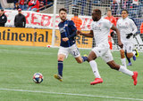 Carles Gil (22), Roland Lamah (7) during New England Revolution and FC Cincinnati MLS match at Gillette Stadium in Foxboro, MA on Sunday, March 24, 2019. The match ended in 2-0 win for FC Cincinnati. CREDIT/ CHRIS ADUAMA