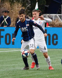 Carles Gil (22), Greg Garza (4) during New England Revolution and FC Cincinnati MLS match at Gillette Stadium in Foxboro, MA on Sunday, March 24, 2019. The match ended in 2-0 win for FC Cincinnati. CREDIT/ CHRIS ADUAMA