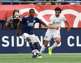 Luis Caicedo (27), Kenny Saief (93) during New England Revolution and FC Cincinnati MLS match at Gillette Stadium in Foxboro, MA on Sunday, March 24, 2019. The match ended in 2-0 win for FC Cincinnati. CREDIT/ CHRIS ADUAMA