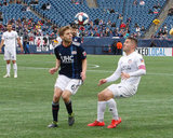 Scott Caldwell (6), Greg Garza (4) during New England Revolution and FC Cincinnati MLS match at Gillette Stadium in Foxboro, MA on Sunday, March 24, 2019. The match ended in 2-0 win for FC Cincinnati. CREDIT/ CHRIS ADUAMA
