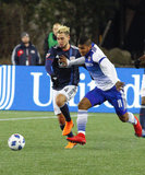 Diego Fagundez (14) and Santiago Mosquera (11) during New England Revolution and FC Dallas MLS match at Gillette Stadium in Foxboro, MA on Saturday, April 14, 2018. Revs lost 0-1. CREDIT/ CHRIS ADUAMA