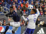 Jalil Anibaba (3) and Cristian Colman (9) during New England Revolution and FC Dallas MLS match at Gillette Stadium in Foxboro, MA on Saturday, April 14, 2018. Revs lost 0-1. CREDIT/ CHRIS ADUAMA