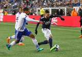 Reggie Cannon (2) and Gabriel Somi (91) during New England Revolution and FC Dallas MLS match at Gillette Stadium in Foxboro, MA on Saturday, April 14, 2018. Revs lost 0-1. CREDIT/ CHRIS ADUAMA