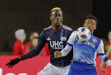 Wilfried Zahibo (23) and Jacori Hayes (15) during New England Revolution and FC Dallas MLS match at Gillette Stadium in Foxboro, MA on Saturday, April 14, 2018. Revs lost 0-1. CREDIT/ CHRIS ADUAMA