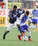 Jalil Anibaba (3) and Cristian Colman (9) during New England Revolution and FC Dallas MLS match at Gillette Stadium in Foxboro, MA on Saturday, April 14, 2018. Revs lost 0-1. CREDIT/ CHRIS ADUAMA