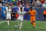 Juan Agudelo (17), Romell Quioto (31) during New England Revolution and Houston Dynamo MLS match at Gillette Stadium in Foxboro, MA on Saturday, June 29, 2019.  Revs won 2-1. CREDIT/CHRIS ADUAMA