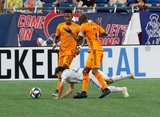 Carles Gil (22), DaMarcus Beasley (7) during New England Revolution and Houston Dynamo MLS match at Gillette Stadium in Foxboro, MA on Saturday, June 29, 2019.  Revs won 2-1. CREDIT/CHRIS ADUAMA