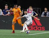 Carles Gil (22), Mauro Manotas (9) during New England Revolution and Houston Dynamo MLS match at Gillette Stadium in Foxboro, MA on Saturday, June 29, 2019.  Revs won 2-1. CREDIT/CHRIS ADUAMA