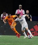Carles Gil (22), Mauro Manotas (9) during New England Revolution and Houston Dynamo MLS match at Gillette Stadium in Foxboro, MA on Saturday, June 29, 2019.  Revs won 2-1. CREDIT/CHRIS ADUAMA