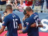 Gustavo Bou (7) celebrates goal with team mates during New England Revolution and Orlando City SC MLS match at Gillette Stadium in Foxboro, MA on Saturday, July 27, 2019.  Revs won 4-1. CREDIT/CHRIS ADUAMA