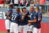 Gustavo Bou (7) celebrates goal with team mates during New England Revolution and Orlando City SC MLS match at Gillette Stadium in Foxboro, MA on Saturday, July 27, 2019.  Revs won 4-1. CREDIT/CHRIS ADUAMA