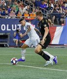 Gustavo Bou (7), Walker Zimmerman (25) during New England Revolution and Los Angeles Football Club MLS match at Gillette Stadium in Foxboro, MA on Saturday, August 3, 2019. LAFC won 2-0. CREDIT/CHRIS ADUAMA