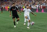 Steven Beitashour (3), Diego Fagundez (14) during New England Revolution and Los Angeles Football Club MLS match at Gillette Stadium in Foxboro, MA on Saturday, August 3, 2019. LAFC won 2-0. CREDIT/CHRIS ADUAMA