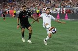 Steven Beitashour (3), Diego Fagundez (14) during New England Revolution and Los Angeles Football Club MLS match at Gillette Stadium in Foxboro, MA on Saturday, August 3, 2019. LAFC won 2-0. CREDIT/CHRIS ADUAMA