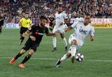 Diego Rossi (9), Brandon Bye (15) during New England Revolution and Los Angeles Football Club MLS match at Gillette Stadium in Foxboro, MA on Saturday, August 3, 2019. LAFC won 2-0. CREDIT/CHRIS ADUAMA