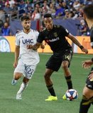 Carles Gil (22), Mark-Anthony Kaye (14) during New England Revolution and Los Angeles Football Club MLS match at Gillette Stadium in Foxboro, MA on Saturday, August 3, 2019. LAFC won 2-0. CREDIT/CHRIS ADUAMA