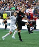 Jordan Harvey (2), Carles Gil (22) during New England Revolution and Los Angeles Football Club MLS match at Gillette Stadium in Foxboro, MA on Saturday, August 3, 2019. LAFC won 2-0. CREDIT/CHRIS ADUAMA