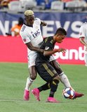 Wilfried Zahibo (23), Latif Blessing (7) during New England Revolution and Los Angeles Football Club MLS match at Gillette Stadium in Foxboro, MA on Saturday, August 3, 2019. LAFC won 2-0. CREDIT/CHRIS ADUAMA