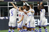 Anthony Jackson-Hamel (11) celebrates first goal with teammates during New England Revolution and Montreal Impact MLS match at Gillete Stadium in Foxboro, MA on Wednesday, April 24, 2019. Montreal beat Revs 3-0. CREDIT/ CHRIS ADUAMA