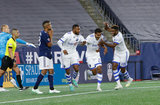 Shamit Shome (28) celebrates goal with teammates during New England Revolution and Montreal Impact MLS match at Gillete Stadium in Foxboro, MA on Wednesday, April 24, 2019. Montreal beat Revs 3-0. CREDIT/ CHRIS ADUAMA