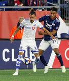 Juan Agudelo (17), Maximiliano Urruti (37) during New England Revolution and Montreal Impact MLS match at Gillette Stadium in Foxboro, MA on Wednesday, April 24, 2019. Montreal beat Revs 3-0. CREDIT/ CHRIS ADUAMA