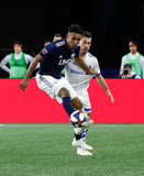 Juan Agudelo (17), Daniel Lovitz (3) during New England Revolution and Montreal Impact MLS match at Gillette Stadium in Foxboro, MA on Wednesday, April 24, 2019. Montreal beat Revs 3-0. CREDIT/ CHRIS ADUAMA