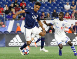 Juan Agudelo (17), Michael Azira (32) during New England Revolution and Montreal Impact MLS match at Gillette Stadium in Foxboro, MA on Wednesday, April 24, 2019. Montreal beat Revs 3-0. CREDIT/ CHRIS ADUAMA