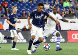 Juan Agudelo (17), Michael Azira (32) during New England Revolution and Montreal Impact MLS match at Gillette Stadium in Foxboro, MA on Wednesday, April 24, 2019. Montreal beat Revs 3-0. CREDIT/ CHRIS ADUAMA