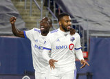 Anthony Jackson-Hamel (11) celebrates second goal with teammates during New England Revolution and Montreal Impact MLS match at Gillete Stadium in Foxboro, MA on Wednesday, April 24, 2019. Montreal beat Revs 3-0. CREDIT/ CHRIS ADUAMA