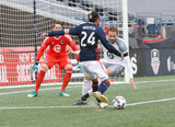Lee Nguyen (24) and Vadim Demidov (6) during New England Revolution and Minnesota United FC MLS match at Gillette Stadium in Foxboro, MA on Saturday, March 25, 2017. Revs won 5-2. CREDIT/ CHRIS ADUAMA