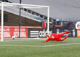 Bobby Shuttleworth (33) tries to save Juan Agudelo's goal during New England Revolution and Minnesota United FC MLS match at Gillette Stadium in Foxboro, MA on Saturday, March 25, 2017. Revs won 5-2. CREDIT/ CHRIS ADUAMA