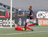 Bobby Shuttleworth (33) and Diego Fagundez (14) during New England Revolution and Minnesota United FC MLS match at Gillette Stadium in Foxboro, MA on Saturday, March 25, 2017. Revs won 5-2. CREDIT/ CHRIS ADUAMA