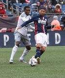 Lee Nguyen (24) and Abu Danladi (9) during New England Revolution and Minnesota United FC MLS match at Gillette Stadium in Foxboro, MA on Saturday, March 25, 2017. Revs won 5-2. CREDIT/ CHRIS ADUAMA