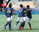 Jalil Anibaba (3) celebrates goal with team mates during New England Revolution and Minnesota United FC MLS match at Gillette Stadium in Foxboro, MA on Saturday, March 30, 2019. Revs won 2-1. CREDIT/ CHRIS ADUAMA