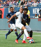 Angelo Rodriguez (9), Jalil Anibaba (3) during New England Revolution and Minnesota United FC MLS match at Gillette Stadium in Foxboro, MA on Saturday, March 30, 2019. Revs won 2-1. CREDIT/ CHRIS ADUAMA