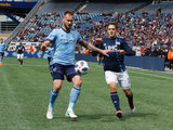 Maxime Chanot (4), Kelyn Rowe (11) during Revolution and NYCFC MLS match at Gillette Stadium in Foxboro, MA on Saturday, March 24, 2018. The match ended 2-2. CREDIT/ CHRIS ADUAMA
