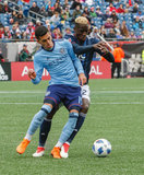 Jesus Medina (19) Wilfried Zahibo (23) during Revolution and NYCFC MLS match at Gillette Stadium in Foxboro, MA on Saturday, March 24, 2018. The match ended 2-2. CREDIT/ CHRIS ADUAMA